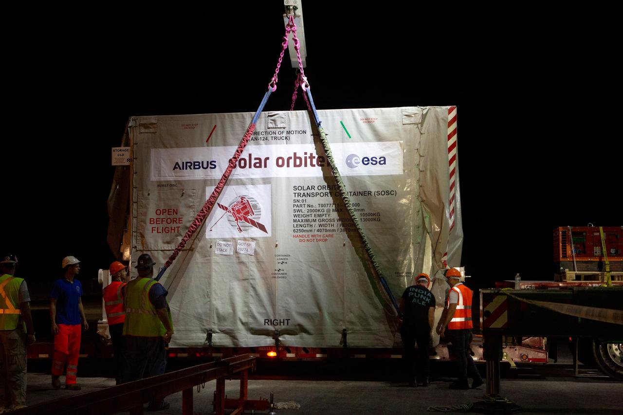 A crane carefully places the Solar Orbiter spacecraft on a truck for transportation from the Launch and Landing Facility at NASA’s Kennedy Space Center in Florida to the Astrotech Space Operations facility in nearby Titusville on Nov. 1, 2019. The spacecraft was delivered to the Florida spaceport aboard an Antonov An-124 cargo plane from Munich, Germany. Solar Orbiter is a European Space Agency mission with strong NASA participation. The mission aims to study the Sun, its outer atmosphere and solar winds. The spacecraft will provide the first images of the Sun’s poles. NASA’s Launch Services Program based at Kennedy is managing the launch. Liftoff is scheduled for Feb. 5, 2020, from Cape Canaveral Air Force Station aboard a United Launch Alliance Atlas V rocket. 