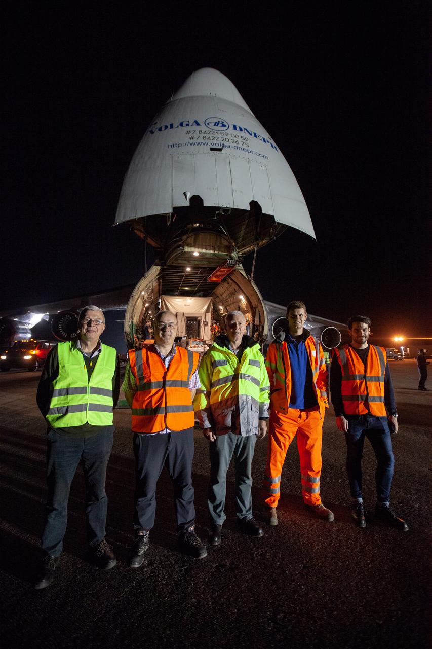 Members of the European Space Agency (ESA)/Airbus Defence and Space team pause for a photo at NASA Kennedy Space Center’s Launch and Landing Facility during the arrival of the Solar Orbiter spacecraft on Nov. 1, 2019. The spacecraft was delivered to the Florida spaceport aboard an Antonov An-124 cargo plane from Munich, Germany, then transported to the Astrotech Space Operations facility in nearby Titusville. Solar Orbiter is a European Space Agency mission with strong NASA participation. The mission aims to study the Sun, its outer atmosphere and solar winds. The spacecraft will provide the first images of the Sun’s poles. NASA’s Launch Services Program based at Kennedy is managing the launch. Liftoff is scheduled for Feb. 5, 2020, from Cape Canaveral Air Force Station aboard a United Launch Alliance Atlas V rocket.