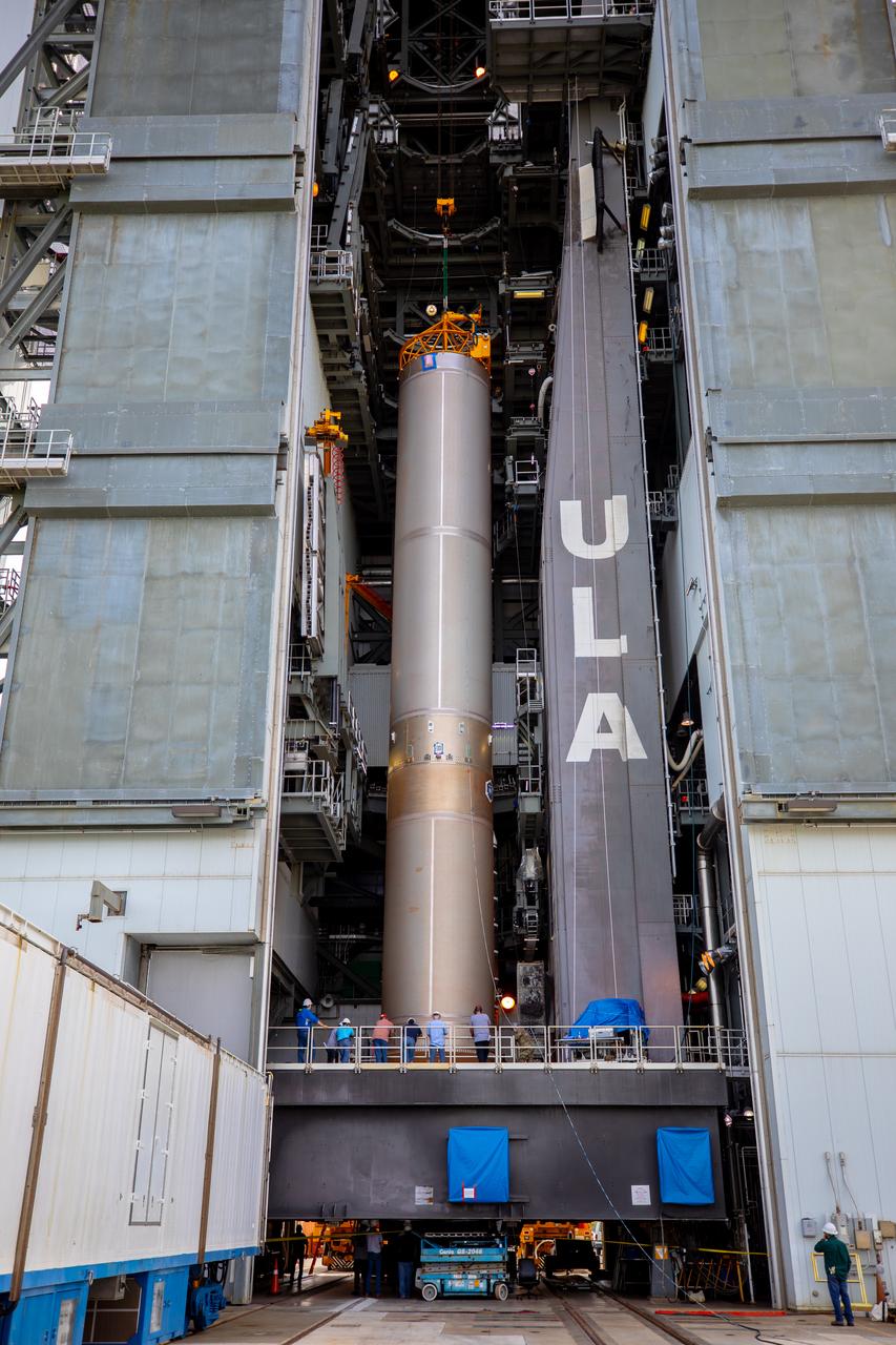 The United Launch Alliance Atlas V first stage is lifted to the vertical position on Nov. 4, 2019, in the Vertical Integration Facility at Space Launch Complex 41 at Cape Canaveral Air Force Station in Florida, in preparation for Boeing’s Orbital Flight Test (OFT). The uncrewed OFT mission will rendezvous and dock Boeing’s CST-100 Starliner spacecraft with the International Space Station as part of NASA’s Commercial Crew Program. Starliner will launch atop the Atlas V rocket from Space Launch Complex 41.