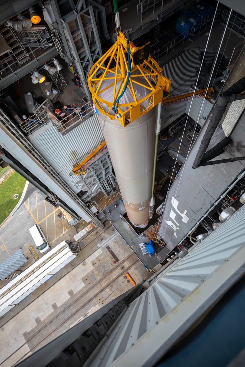 The United Launch Alliance Atlas V first stage is lifted to the vertical position on Nov. 4, 2019, in the Vertical Integration Facility at Space Launch Complex 41 at Cape Canaveral Air Force Station in Florida, in preparation for Boeing’s Orbital Flight Test (OFT). The uncrewed OFT mission will rendezvous and dock Boeing’s CST-100 Starliner spacecraft with the International Space Station as part of NASA’s Commercial Crew Program. Starliner will launch atop the Atlas V rocket from Space Launch Complex 41.