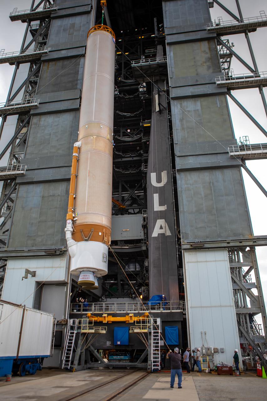 The United Launch Alliance Atlas V first stage is lifted to the vertical position on Nov. 4, 2019, in the Vertical Integration Facility at Space Launch Complex 41 at Cape Canaveral Air Force Station in Florida, in preparation for Boeing’s Orbital Flight Test (OFT). The uncrewed OFT mission will rendezvous and dock Boeing’s CST-100 Starliner spacecraft with the International Space Station as part of NASA’s Commercial Crew Program. Starliner will launch atop the Atlas V rocket from Space Launch Complex 41.