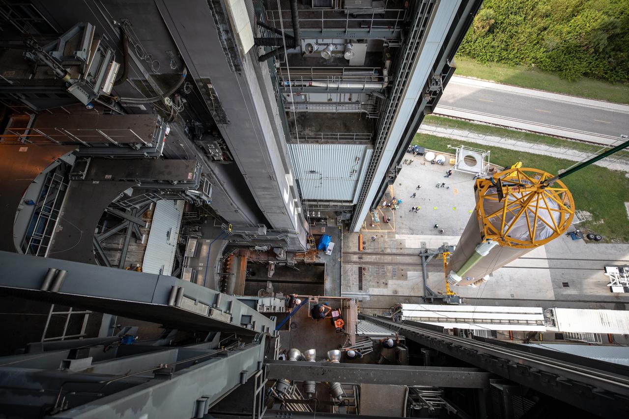 The United Launch Alliance Atlas V first stage is lifted to the vertical position on Nov. 4, 2019, in the Vertical Integration Facility at Space Launch Complex 41 at Cape Canaveral Air Force Station in Florida, in preparation for Boeing’s Orbital Flight Test (OFT). The uncrewed OFT mission will rendezvous and dock Boeing’s CST-100 Starliner spacecraft with the International Space Station as part of NASA’s Commercial Crew Program. Starliner will launch atop the Atlas V rocket from Space Launch Complex 41.