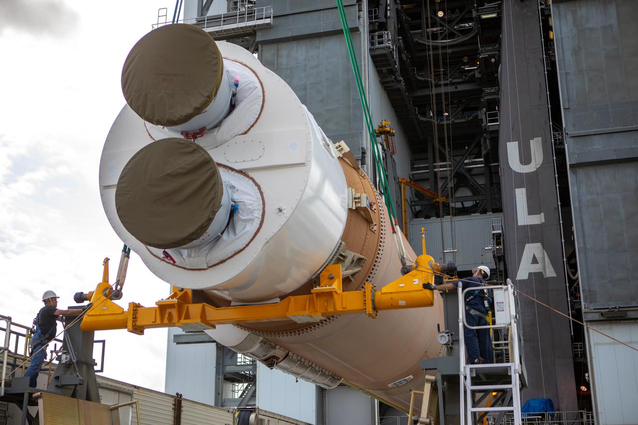 The United Launch Alliance Atlas V first stage is lifted to the vertical position on Nov. 4, 2019, in the Vertical Integration Facility at Space Launch Complex 41 at Cape Canaveral Air Force Station in Florida, in preparation for Boeing’s Orbital Flight Test (OFT). The uncrewed OFT mission will rendezvous and dock Boeing’s CST-100 Starliner spacecraft with the International Space Station as part of NASA’s Commercial Crew Program. Starliner will launch atop the Atlas V rocket from Space Launch Complex 41.