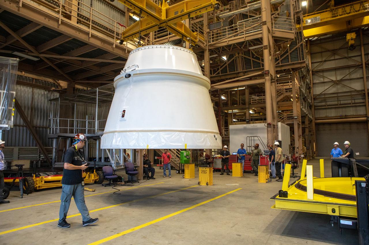 The first Northrop Grumman aft exit cone to arrive for the Space Launch System’s solid rocket boosters is moved by crane inside the Rotation, Processing and Surge Facility at NASA’s Kennedy Space Center in Florida on Nov. 4, 2019. The aft exit cone was shipped from Promontory, Utah. It will be checked out and prepared for the Artemis I uncrewed test flight. The aft exit cones sit at the bottommost part of the twin boosters. They are attached to the aft skirts, which contain the booster separation motors. The exit cones help to protect the aft skirts during launch.
