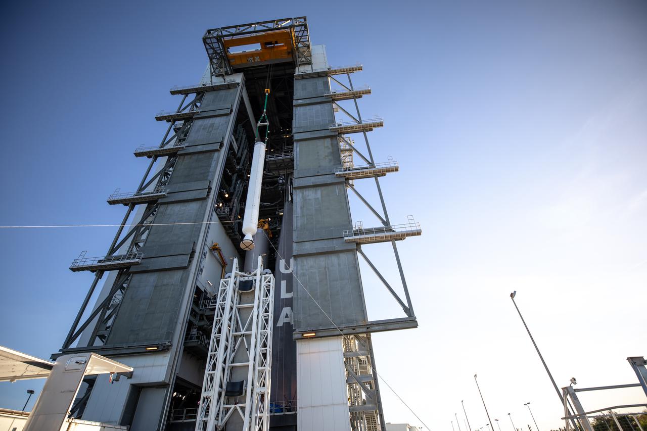 Two solid rocket boosters are mated to a United Launch Alliance Atlas V first stage inside the Vertical Integration Facility at Space Launch Complex 41 at Cape Canaveral Air Force Station in Florida on Nov. 7, 2019, in preparation for Boeing’s Orbital Flight Test (OFT). The uncrewed OFT mission will rendezvous and dock Boeing’s CST-100 Starliner spacecraft with the International Space Station as part of NASA’s Commercial Crew Program. Starliner will launch atop the Atlas V rocket from Space Launch Complex 41.