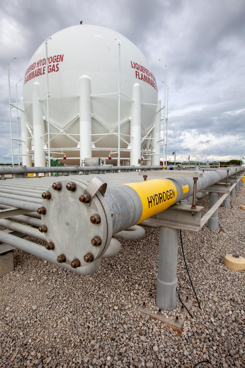 A liquid hydrogen storage tank is photographed at Launch Pad 39B on Nov. 8, 2019, at NASA’s Kennedy Space Center in Florida. The agency’s Exploration Ground Systems oversaw testing of the pad’s cryogenic systems – the infrastructure that will support the flow of liquid hydrogen and liquid oxygen from the storage tanks to the Space Launch System (SLS) rocket – in preparation for the launch of SLS with the Orion spacecraft atop for the uncrewed Artemis I mission. Each of the liquid hydrogen and liquid oxygen tanks can hold more than 800,000 gallons of propellant. The liquid hydrogen, lighter than liquid oxygen, will make its way from the tank to the rocket using gaseous hydrogen to pressurize the sphere at the time of launch, while the liquid oxygen will be sent to the rocket via pumps. 