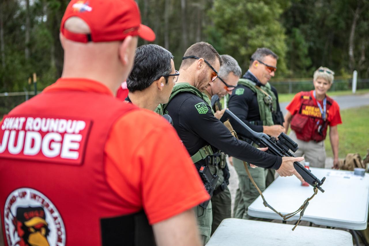 Members of NASA Kennedy Space Center's Emergency Response Team check their firearms as they prepare for the next tactical challenge at the 37th Annual SWAT Round-Up International at the Lawson Lamar Firearms and Tactical Training Center in Orlando, Florida. The competition was held Nov. 10 to 15, 2019, and featured five different tactical challenges. Kennedy's ERT members exchanged best practices and competed with more than 50 teams from the U.S. and around the world.