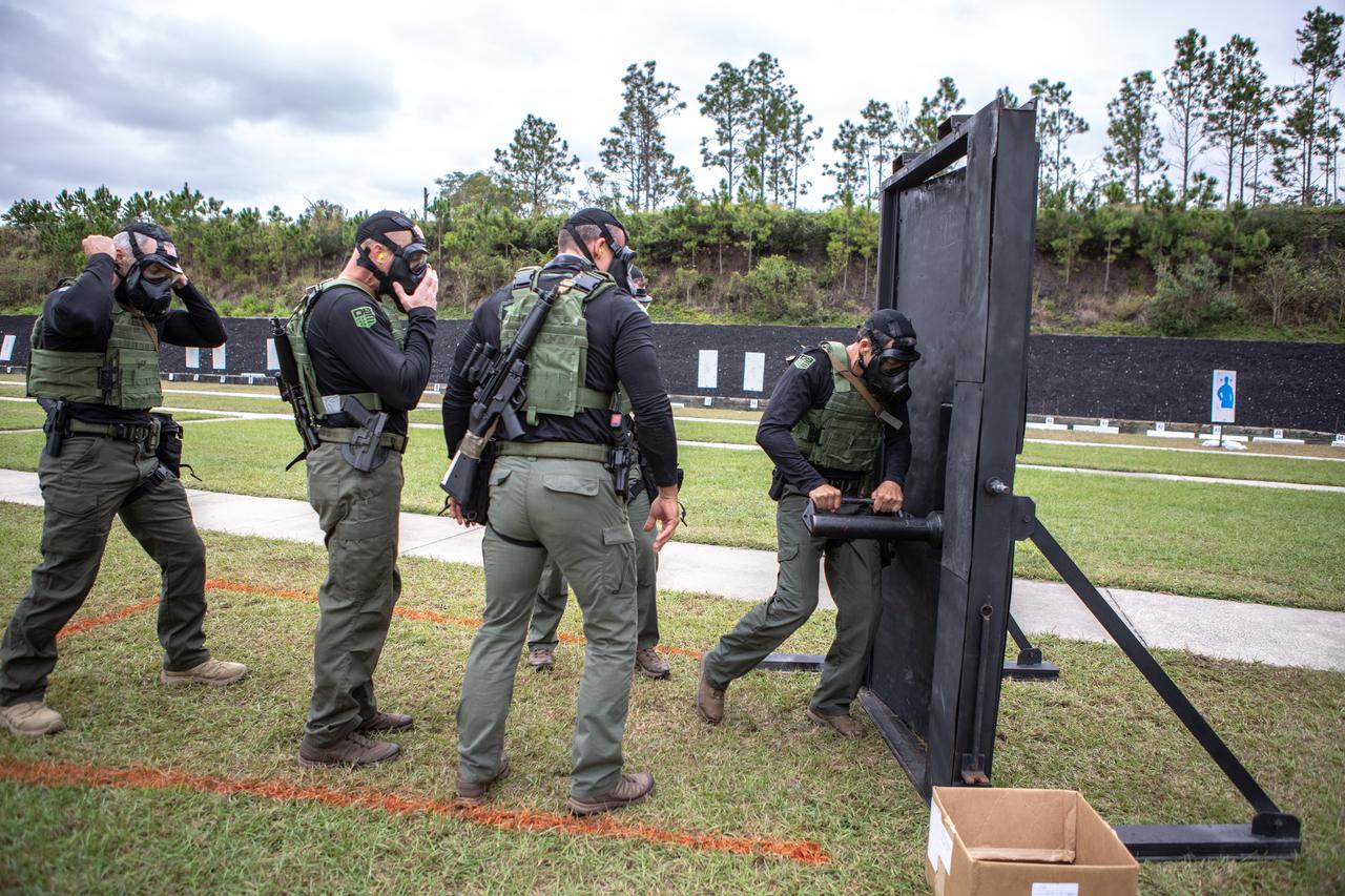Members of NASA Kennedy Space Center's Emergency Response Team prepare to break through a barricade during one of the tactical challenges at the 37th Annual SWAT Round-Up International at the Lawson Lamar Firearms and Tactical Training Center in Orlando, Florida. The competition was held Nov. 10 to 15, 2019, and featured five different tactical challenges. Kennedy's ERT members exchanged best practices and competed with more than 50 teams from the U.S. and around the world.