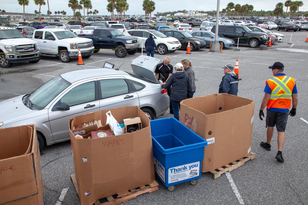 Household items are dropped off in the Vehicle Assembly Building parking lot at Kennedy Space Center on Nov. 13, 2019, as part of America Recycles Day. The Florida spaceport partnered with Goodwill Industries and several other organizations to put on the annual two-day event. A second collection day took place near the Kennedy Learning Institute. This year, employees accounted for 211 drop-offs, totaling approximately 5,500 pounds.