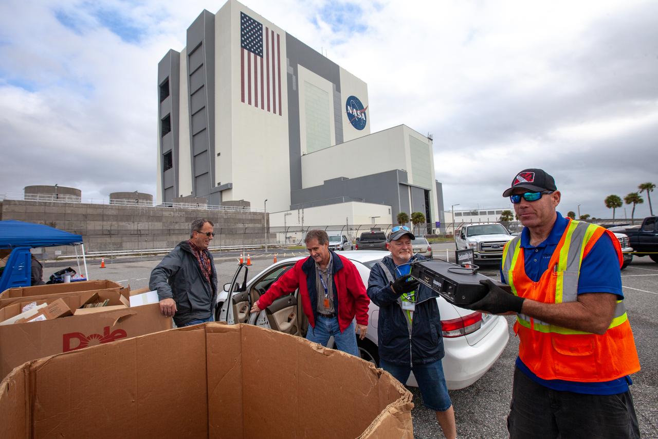 Household items are dropped off in the Vehicle Assembly Building parking lot at Kennedy Space Center on Nov. 13, 2019, as part of America Recycles Day. The Florida spaceport partnered with Goodwill Industries and several other organizations to put on the annual two-day event. A second collection day took place near the Kennedy Learning Institute. This year, employees accounted for 211 drop-offs, totaling approximately 5,500 pounds.