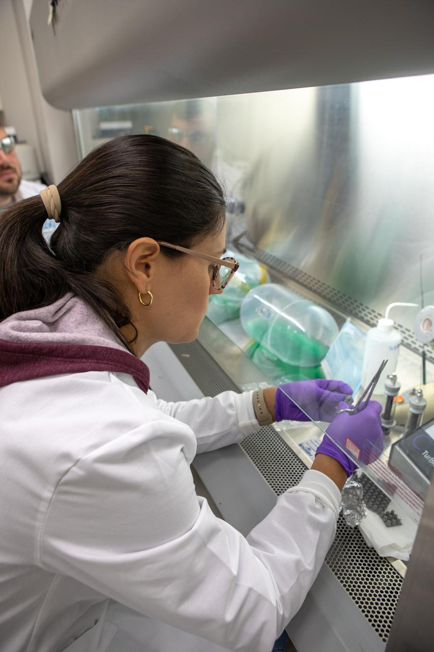 Kennedy Space Center’s Carolina Franco, Ph.D., conducts a biological study on two tanks of water, filled with green dye, in the Florida spaceport’s Neil Armstrong Operations and Checkout Building on Nov. 13, 2019. The tanks have recently returned to Kennedy after spending the last five years on the International Space Station for an experiment to study slosh, or the movement of water, in a zero-gravity environment to help engineers predict the movement of propellant in rocket tanks. Kennedy’s Air and Water Revitalization lab is studying the water tanks to determine if there is, or was, any microbial growth within them. The results will help NASA determine whether clean water can be stored in space for long-duration missions, an essential component to keeping astronauts safe and healthy as the agency prepares for missions to the Moon and beyond to Mars. 