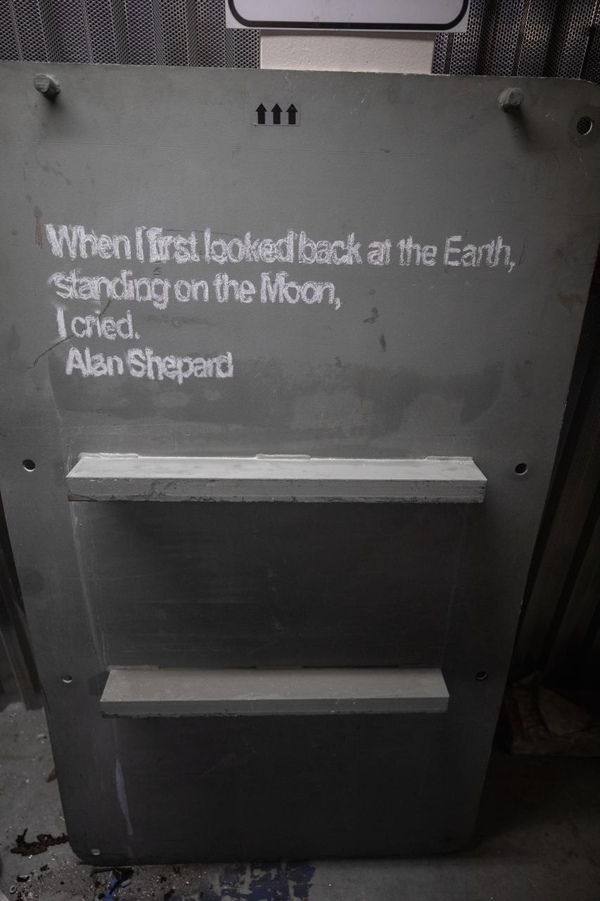 Each of the eight haunch access doors located in the mobile launcher platform contains an inspirational quote related to space travel. The quotes are from John F. Kennedy, H.G. Wells and Werner Von Braun, among others. The heavy metal doors will be bolted in place to protect electrical and support systems during liftoff of the Space Launch System rocket and Orion spacecraft.