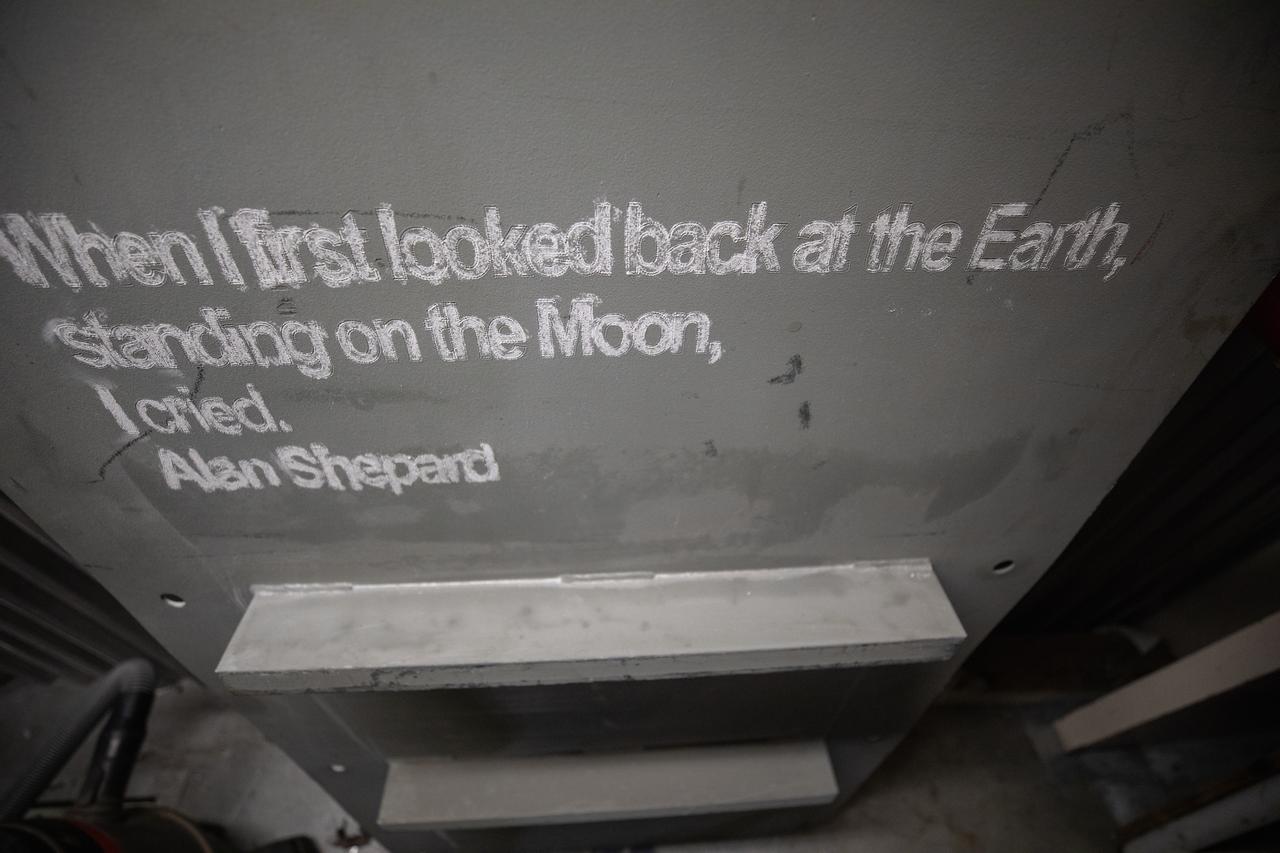 Each of the eight haunch access doors located in the mobile launcher platform contains an inspirational quote related to space travel. The quotes are from John F. Kennedy, H.G. Wells and Werner Von Braun, among others. The heavy metal doors will be bolted in place to protect electrical and support systems during liftoff of the Space Launch System rocket and Orion spacecraft.