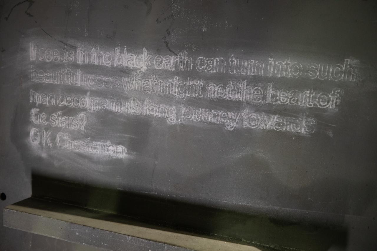 Each of the eight haunch access doors located in the mobile launcher platform contains an inspirational quote related to space travel. The quotes are from John F. Kennedy, H.G. Wells and Werner Von Braun, among others. The heavy metal doors will be bolted in place to protect electrical and support systems during liftoff of the Space Launch System rocket and Orion spacecraft.