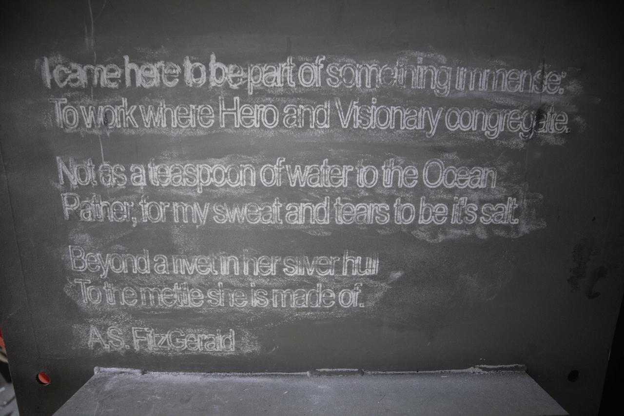Each of the eight haunch access doors located in the mobile launcher platform contains an inspirational quote related to space travel. The quotes are from John F. Kennedy, H.G. Wells and Werner Von Braun, among others. The heavy metal doors will be bolted in place to protect electrical and support systems during liftoff of the Space Launch System rocket and Orion spacecraft.