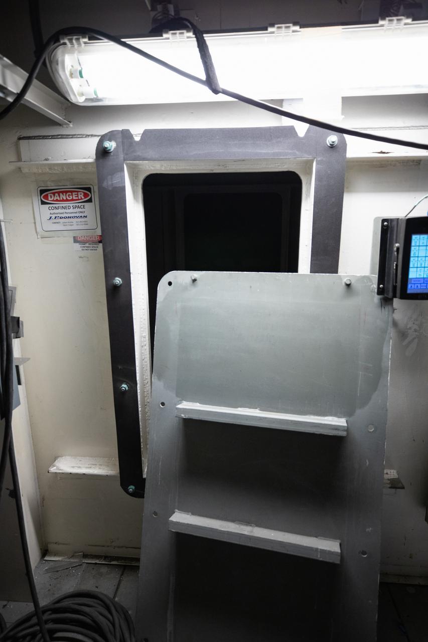 Each of the eight haunch access doors located in the mobile launcher platform contains an inspirational quote related to space travel. The quotes are from John F. Kennedy, H.G. Wells and Werner Von Braun, among others. The heavy metal doors will be bolted in place to protect electrical and support systems during liftoff of the Space Launch System rocket and Orion spacecraft.