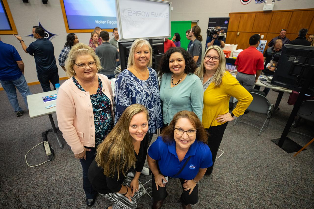 Kennedy Space Center employees are photographed at an innovation showcase, hosted by the Office of the Chief Technologist, on Nov. 19, 2019, in the Florida spaceport’s Neil Armstrong Operations and Checkout Building’s Mission Briefing Room. On the bottom right is Kathy Loftin, deputy chief technologist at Kennedy. Nearly 50 exhibitors gathered to participate in the center’s Innovation Days – one of several events throughout the year aimed at fostering and encouraging an innovative culture at Kennedy. Showcase participants included individuals from multiple directorates, programs and organizations throughout Kennedy. In addition to the showcase, employees had the opportunity to attend an overview presentation on NASA’s Human Landing System (HLS), hosted by HLS Program Manager Lisa Watson-Morgan. 