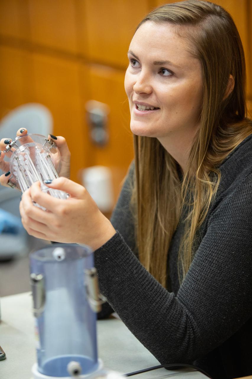 Melanie Pickett, a post-doctorate researcher at NASA’s Kennedy Space Center in Florida, participates in an innovation showcase on Nov. 19, 2019, in the Neil Armstrong Operations and Checkout Building’s Mission Briefing Room. A first-time participant, Pickett presented information on an Algae Membrane Photobioreactor she and others are developing that would eliminate the need for sending water treated with toxic chemicals – currently used to break down urine – to the International Space Station. Nearly 50 exhibitors gathered to demonstrate new technologies and innovations during the center’s Innovation Days – one of several events throughout the year aimed at fostering and encouraging an innovative culture at Kennedy. Showcase participants included individuals from multiple directorates, programs and organizations throughout Kennedy. In addition to the showcase, employees had the opportunity to attend an overview presentation on NASA’s Human Landing System (HLS), hosted by HLS Program Manager Lisa Watson-Morgan.