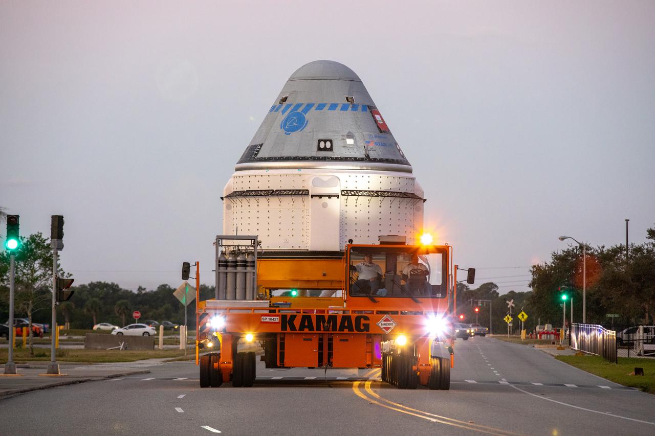 The Boeing CST-100 Starliner spacecraft rolls out from the company’s Commercial Crew and Cargo Processing Facility at NASA’s Kennedy Space Center in Florida on Nov. 21, 2019. The spacecraft will make the trip to Space Launch Complex 41 at Cape Canaveral Air Force Station where it will be prepared for Boeing’s Orbital Flight Test to the International Space Station for NASA’s Commercial Crew Program.