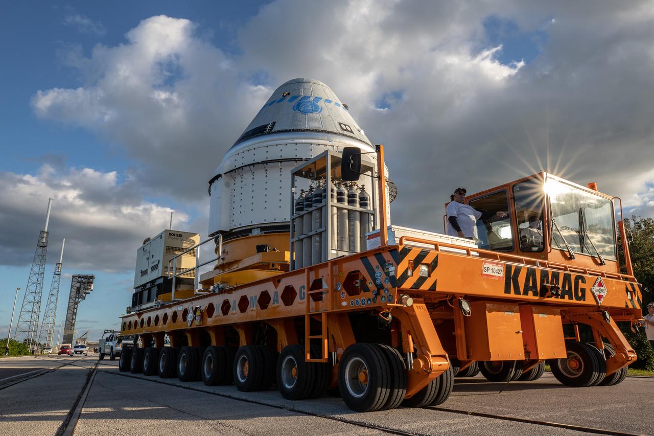 The Boeing CST-100 Starliner spacecraft arrives at the Vertical Integration Facility at Space Launch Complex 41 at Florida’s Cape Canaveral Air Force Station on Nov. 21, 2019. Starliner will be secured atop a United Launch Alliance Atlas V rocket for Boeing’s Orbital Flight Test to the International Space Station for NASA’s Commercial Crew Program. The spacecraft rolled out from Boeing’s Commercial Crew and Cargo Processing Facility at NASA’s Kennedy Space Center earlier in the day.