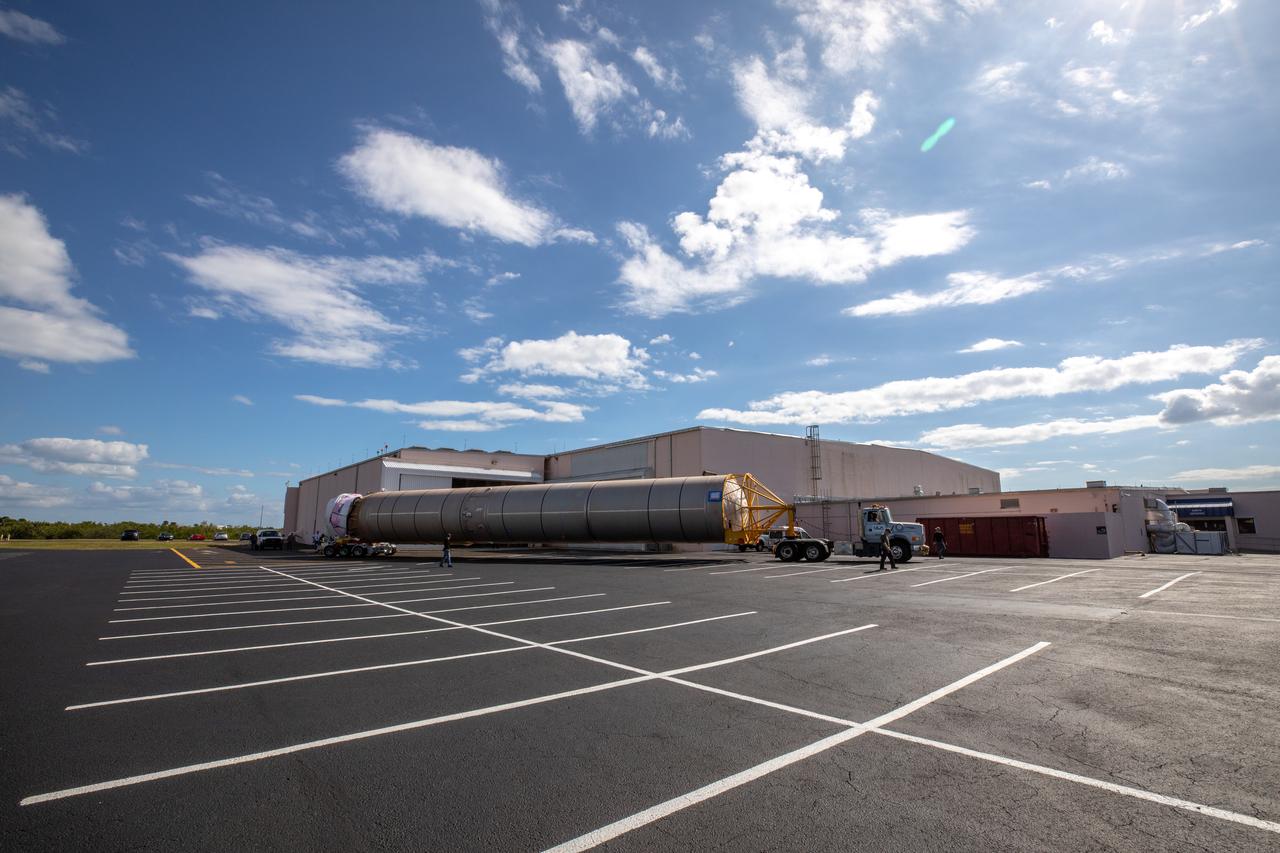 The United Launch Alliance Atlas V booster that will launch the Solar Orbiter spacecraft is delivered by truck to the Atlas Spaceflight Operations Center at Florida’s Cape Canaveral Air Force Station on Nov. 21, 2019. The company’s Rocketship vessel carried the booster from its manufacturing facility in Decatur, Alabama, to Port Canaveral. Solar Orbiter is a European Space Agency mission with strong NASA participation. The mission aims to study the Sun, its outer atmosphere and solar winds. The spacecraft will provide the first images of the Sun’s poles. NASA’s Launch Services Program based at Kennedy is managing the launch. Liftoff is scheduled for Feb. 5, 2020, from Launch Complex 41 at Cape Canaveral Air Force Station aboard the ULA Atlas V rocket.