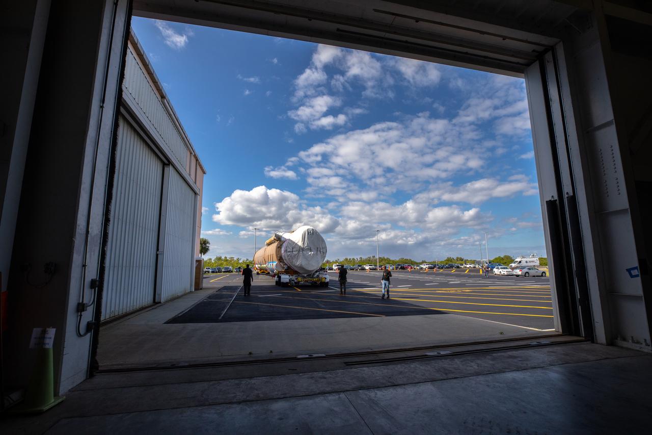 The United Launch Alliance Atlas V booster that will launch the Solar Orbiter spacecraft is delivered by truck to the Atlas Spaceflight Operations Center at Florida’s Cape Canaveral Air Force Station on Nov. 21, 2019. The company’s Rocketship vessel carried the booster from its manufacturing facility in Decatur, Alabama, to Port Canaveral. Solar Orbiter is a European Space Agency mission with strong NASA participation. The mission aims to study the Sun, its outer atmosphere and solar winds. The spacecraft will provide the first images of the Sun’s poles. NASA’s Launch Services Program based at Kennedy is managing the launch. Liftoff is scheduled for Feb. 5, 2020, from Launch Complex 41 at Cape Canaveral Air Force Station aboard the ULA Atlas V rocket.