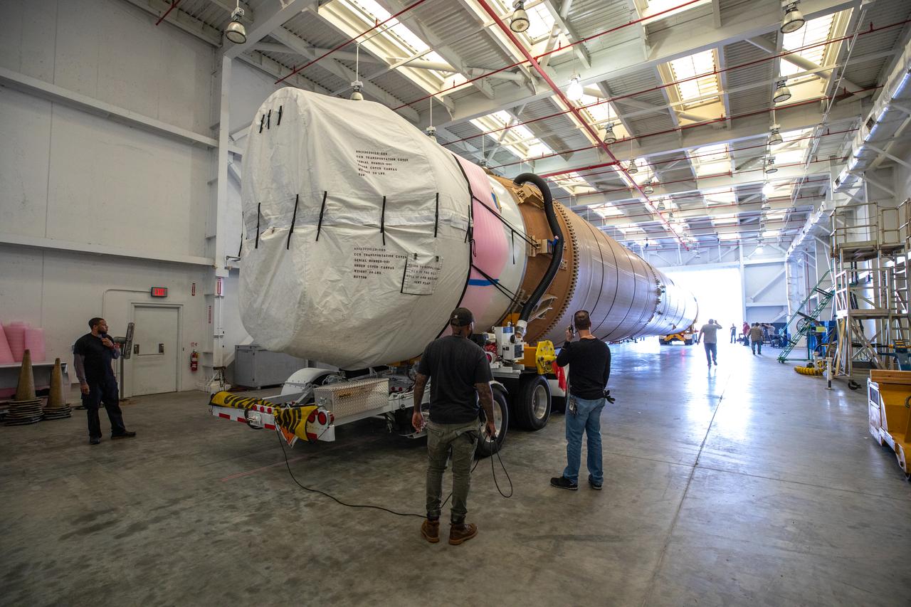The United Launch Alliance Atlas V booster that will launch the Solar Orbiter spacecraft is delivered by truck to the Atlas Spaceflight Operations Center at Florida’s Cape Canaveral Air Force Station on Nov. 21, 2019. The company’s Rocketship vessel carried the booster from its manufacturing facility in Decatur, Alabama, to Port Canaveral. Solar Orbiter is a European Space Agency mission with strong NASA participation. The mission aims to study the Sun, its outer atmosphere and solar winds. The spacecraft will provide the first images of the Sun’s poles. NASA’s Launch Services Program based at Kennedy is managing the launch. Liftoff is scheduled for Feb. 5, 2020, from Launch Complex 41 at Cape Canaveral Air Force Station aboard the ULA Atlas V rocket.