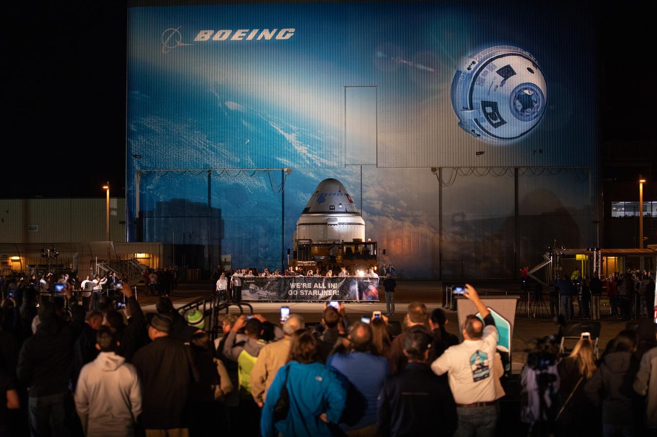 The Boeing CST-100 Starliner spacecraft rolls out from the company’s Commercial Crew and Cargo Processing Facility at NASA’s Kennedy Space Center in Florida on Nov. 21, 2019. The spacecraft will make the trip to Space Launch Complex 41 at Cape Canaveral Air Force Station where it will be secured atop a United Launch Alliance Atlas V rocket for Boeing’s Orbital Flight Test to the International Space Station for NASA’s Commercial Crew Program.