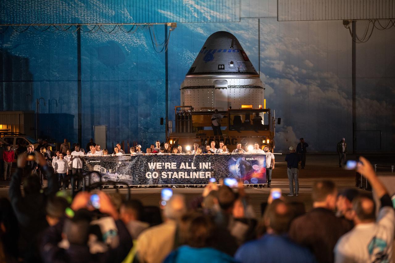 The Boeing CST-100 Starliner spacecraft rolls out from the company’s Commercial Crew and Cargo Processing Facility at NASA’s Kennedy Space Center in Florida on Nov. 21, 2019. The spacecraft will make the trip to Space Launch Complex 41 at Cape Canaveral Air Force Station where it will be secured atop a United Launch Alliance Atlas V rocket for Boeing’s Orbital Flight Test to the International Space Station for NASA’s Commercial Crew Program.