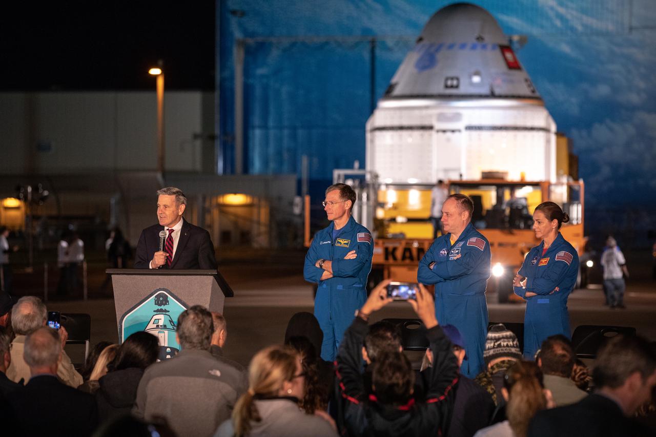 Kennedy Space Center Director Bob Cabana speaks during the Boeing CST-100 Starliner spacecraft rollout from the company’s Commercial Crew and Cargo Processing Facility at the Florida spaceport on Nov. 21, 2019. To Cabana’s left (from left to right) are Boeing astronaut Chris Ferguson and NASA astronauts Mike Fincke and Nicole Mann. Starliner will make the trip to Space Launch Complex 41 at Cape Canaveral Air Force Station where it will be secured atop a United Launch Alliance Atlas V rocket for Boeing’s Orbital Flight Test to the International Space Station for NASA’s Commercial Crew Program.