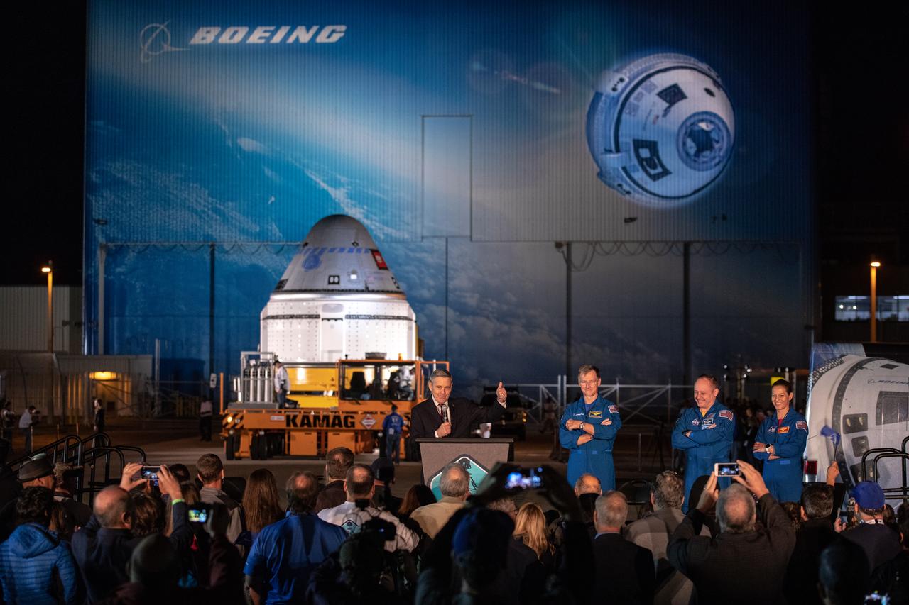 Kennedy Space Center Director Bob Cabana speaks during the Boeing CST-100 Starliner spacecraft rollout from the company’s Commercial Crew and Cargo Processing Facility at the Florida spaceport on Nov. 21, 2019. To Cabana’s left (from left to right) are Boeing astronaut Chris Ferguson and NASA astronauts Mike Fincke and Nicole Mann. Starliner will make the trip to Space Launch Complex 41 at Cape Canaveral Air Force Station where it will be secured atop a United Launch Alliance Atlas V rocket for Boeing’s Orbital Flight Test to the International Space Station for NASA’s Commercial Crew Program.