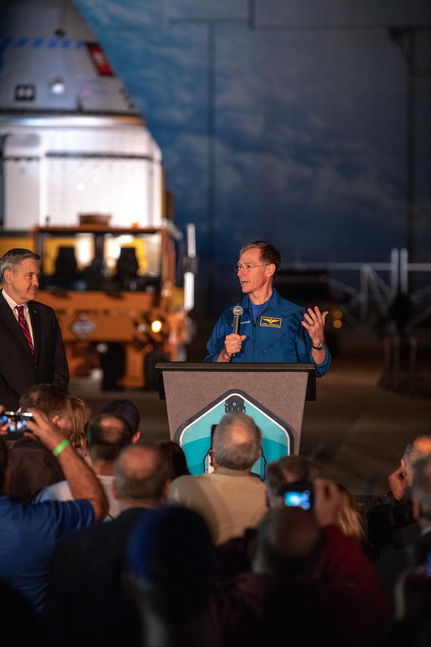 Boeing astronaut Chris Ferguson speaks during the Boeing CST-100 Starliner spacecraft rollout from the company’s Commercial Crew and Cargo Processing Facility at Kennedy Space Center in Florida on Nov. 21, 2019. To his right is Kennedy Space Center Director Bob Cabana. Starliner will make the trip to Space Launch Complex 41 at Cape Canaveral Air Force Station where it will be secured atop a United Launch Alliance Atlas V rocket for Boeing’s Orbital Flight Test to the International Space Station for NASA’s Commercial Crew Program.