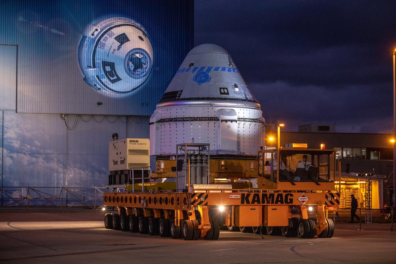 The Boeing CST-100 Starliner spacecraft rolls out from the company’s Commercial Crew and Cargo Processing Facility at NASA’s Kennedy Space Center in Florida on Nov. 21, 2019. The spacecraft will make the trip to Space Launch Complex 41 at Cape Canaveral Air Force Station where it will be secured atop a United Launch Alliance Atlas V rocket for Boeing’s Orbital Flight Test to the International Space Station for NASA’s Commercial Crew Program.
