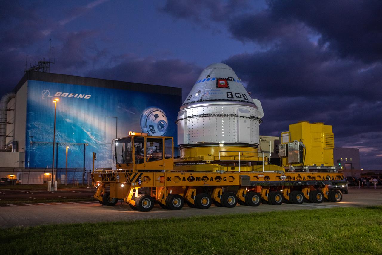 The Boeing CST-100 Starliner spacecraft rolls out from the company’s Commercial Crew and Cargo Processing Facility at NASA’s Kennedy Space Center in Florida on Nov. 21, 2019. The spacecraft will make the trip to Space Launch Complex 41 at Cape Canaveral Air Force Station where it will be secured atop a United Launch Alliance Atlas V rocket for Boeing’s Orbital Flight Test to the International Space Station for NASA’s Commercial Crew Program.