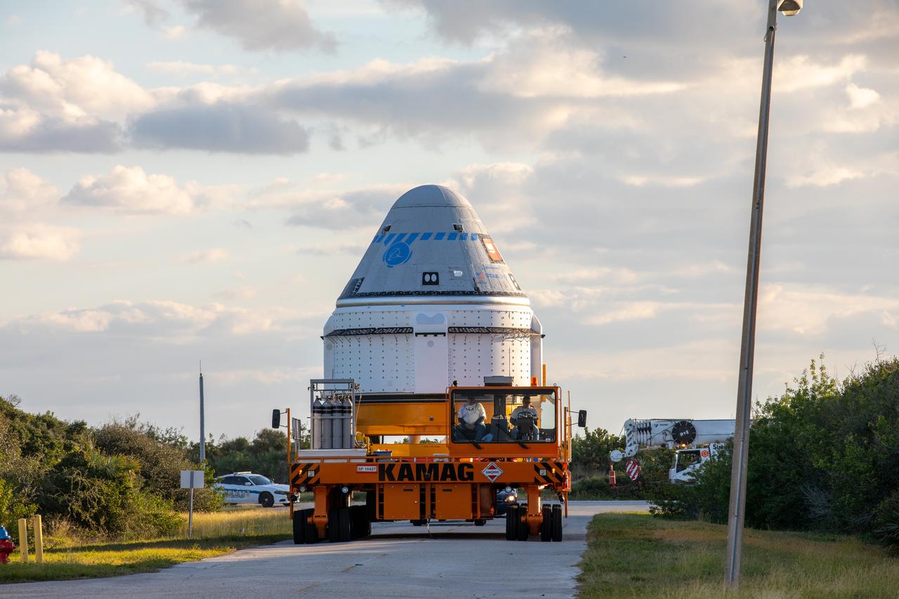 On Nov. 21, 2019, the Boeing CST-100 Starliner spacecraft makes the trip to Space Launch Complex 41 at Cape Canaveral Air Force Station in Florida where it will be secured atop a United Launch Alliance Atlas V rocket for Boeing’s Orbital Flight Test to the International Space Station for NASA’s Commercial Crew Program. Starliner rolled out from Boeing’s Commercial Crew and Cargo Processing Facility at NASA’s Kennedy Space Center earlier in the day.