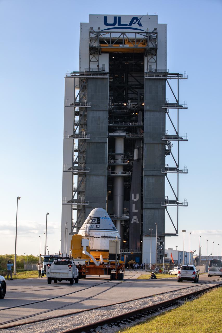 The Boeing CST-100 Starliner spacecraft arrives at the Vertical Integration Facility at Space Launch Complex 41 at Cape Canaveral Air Force Station in Florida on Nov. 21, 2019. Starliner will be secured atop a United Launch Alliance Atlas V rocket for Boeing’s Orbital Flight Test to the International Space Station for NASA’s Commercial Crew Program. The spacecraft rolled out from Boeing’s Commercial Crew and Cargo Processing Facility at NASA’s Kennedy Space Center earlier in the day.
