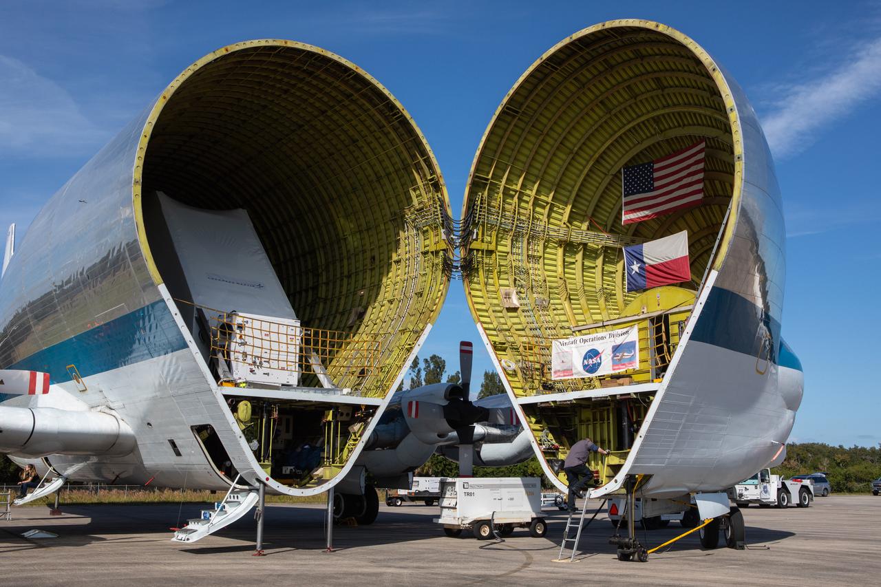 NASA’s Orion spacecraft is loaded into the agency’s Super Guppy aircraft at the Launch and Landing Facility runway at Kennedy Space Center in Florida on Nov. 21, 2019. The spacecraft’s crew and service modules are flying to NASA’s Plum Brook Station in Sandusky, Ohio, for full thermal vacuum testing. In this unique facility, the crew and service modules will be put through extensive testing to ensure they can survive the rigors of launch, space travel, re-entry and splashdown. The Orion spacecraft will launch atop the agency's Space Launch System rocket on Artemis I.