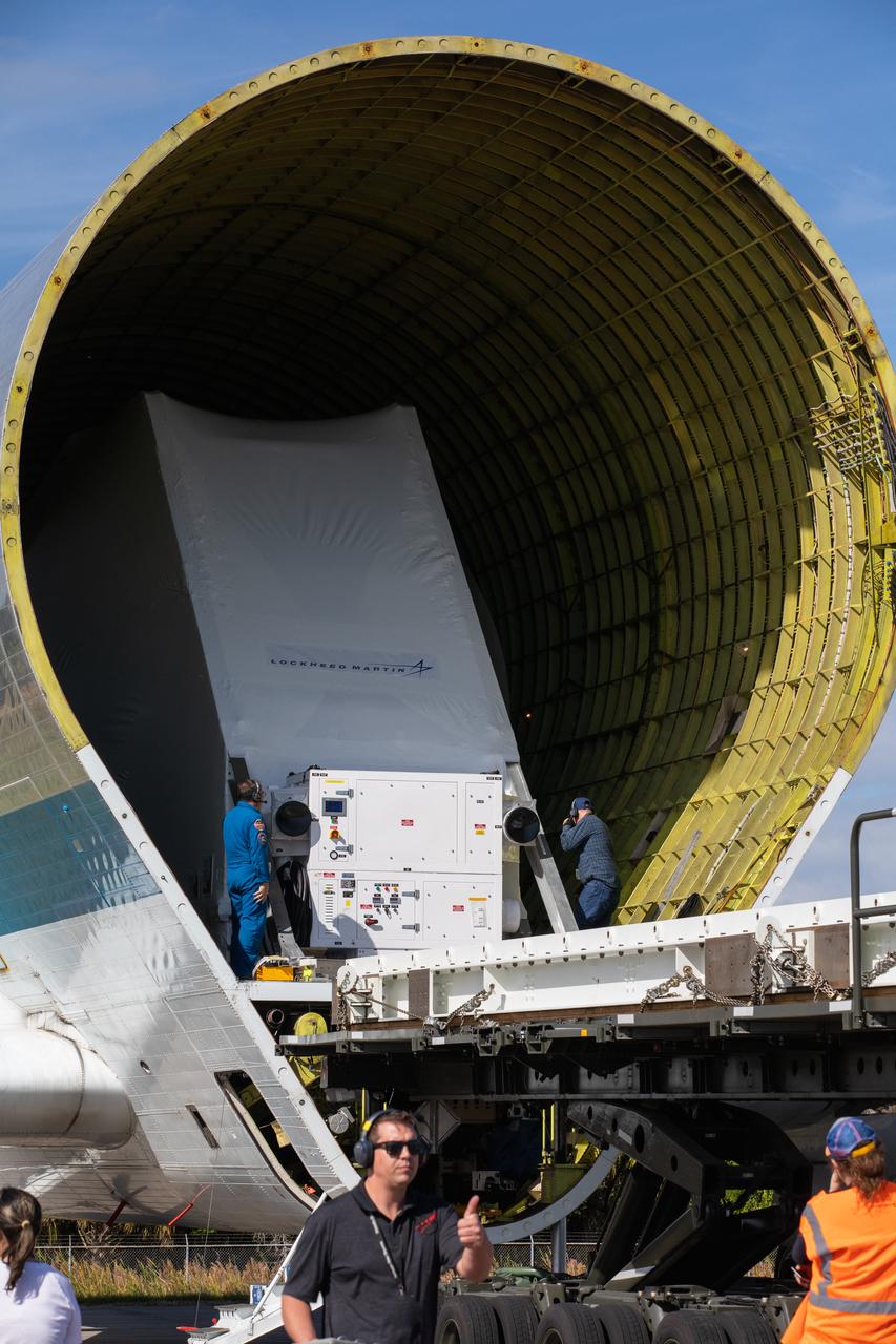 NASA’s Orion spacecraft is loaded into the agency’s Super Guppy aircraft at the Launch and Landing Facility runway at Kennedy Space Center in Florida on Nov. 21, 2019. The spacecraft’s crew and service modules are flying to NASA’s Plum Brook Station in Sandusky, Ohio, for full thermal vacuum testing. In this unique facility, the crew and service modules will be put through extensive testing to ensure they can survive the rigors of launch, space travel, re-entry and splashdown. The Orion spacecraft will launch atop the agency's Space Launch System rocket on Artemis I.