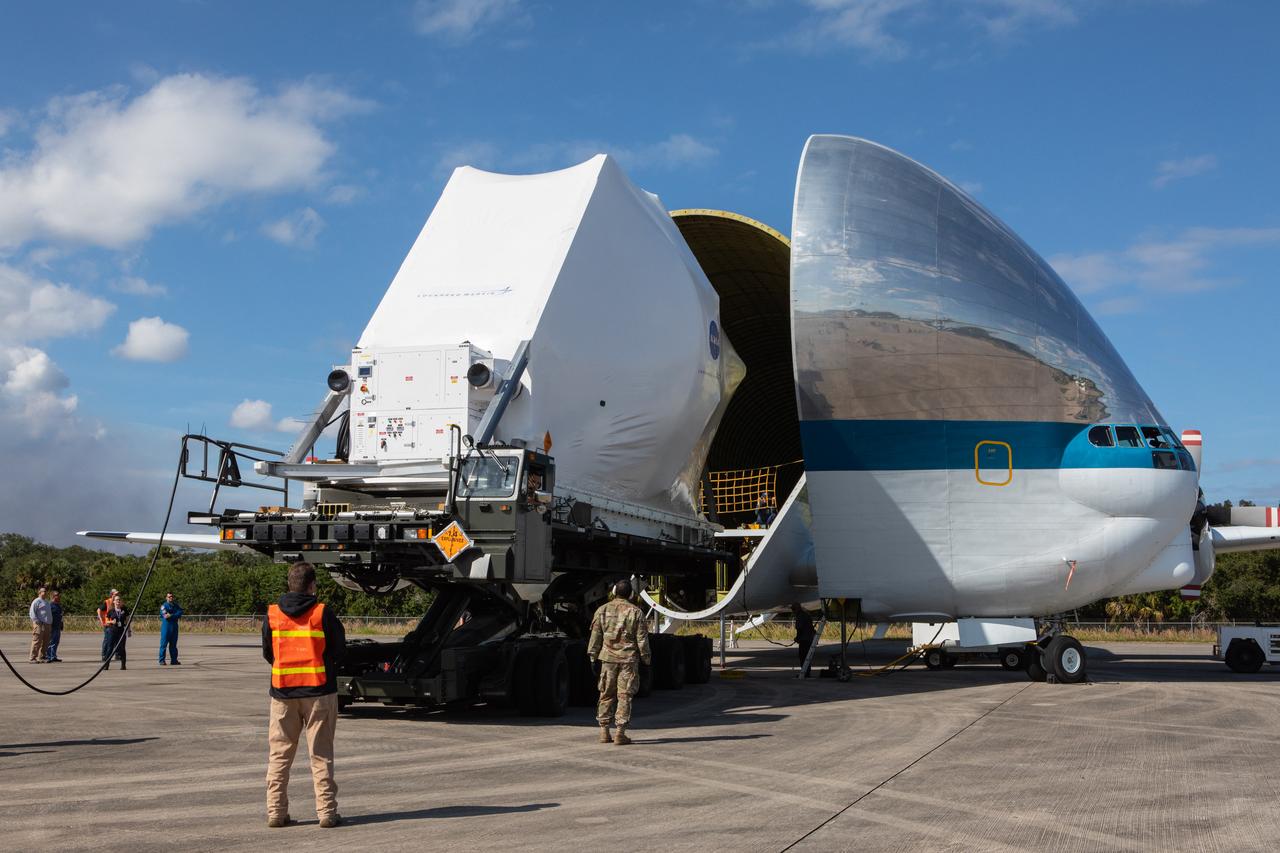 NASA’s Orion spacecraft, wrapped up for shipping, is moved into position for loading into the agency’s Super Guppy aircraft at the Launch and Landing Facility runway at Kennedy Space Center in Florida on Nov. 21, 2019. The spacecraft’s crew and service modules are flying to NASA’s Plum Brook Station in Sandusky, Ohio, for full thermal vacuum testing. In this unique facility, the crew and service modules will be put through extensive testing to ensure they can survive the rigors of launch, space travel, re-entry and splashdown. The Orion spacecraft will launch atop the agency's Space Launch System rocket on Artemis I.