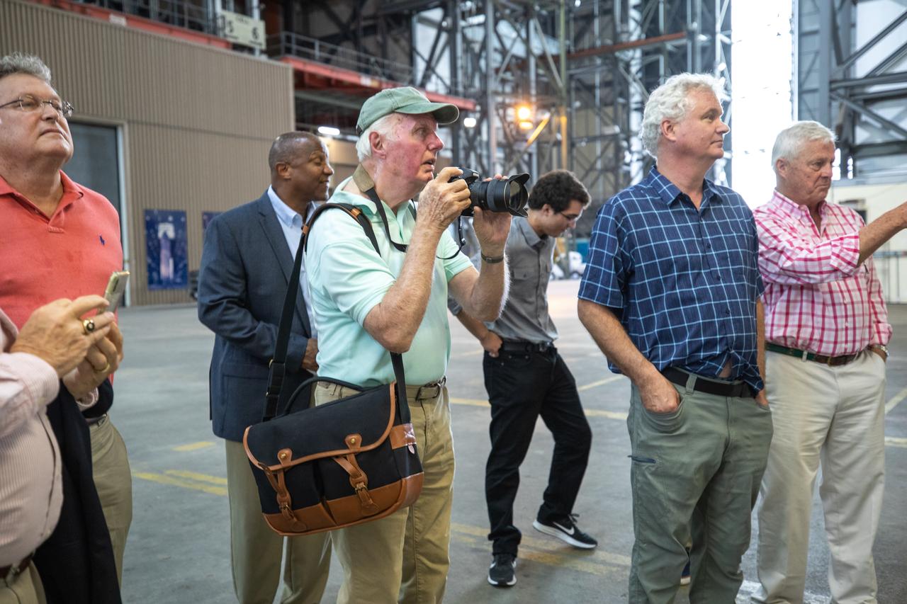 Dick Bergmann, far left in front, original lead designer for the Vehicle Assembly Building (VAB), tours the iconic facility at Kennedy Space Center in Florida with descendants of Max Urbahn, the original architect, on Nov. 22, 2019. Behind Bergmann is Kelvin Manning, Kennedy associate director, technical. The Florida Section American Society of Civil Engineers bestowed its National Historic Civil Engineering Landmark award to the facility. The VAB is the first building at Kennedy Space Center to earn this distinction. At the time of its completion, the 129-million-cubic-foot structure was the largest building in the world. Originally designed and built to accommodate the Saturn V/Apollo used in Project Apollo, the VAB was later modified for its role in the Space Shuttle Program.