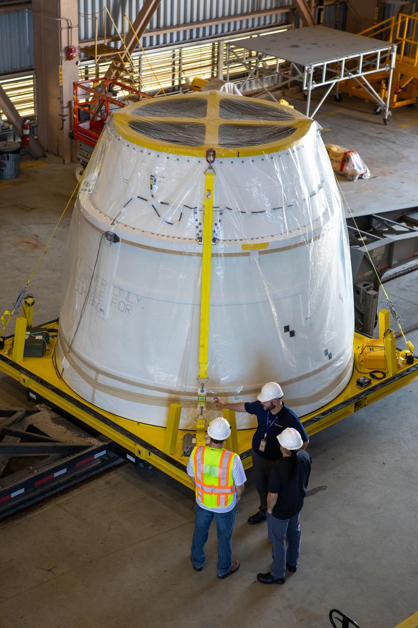 The shipping container has been removed from the second of two Northrop Grumman-manufactured aft exit cones to arrive for the Space Launch System’s solid rocket boosters inside the Rotation, Processing and Surge Facility at NASA’s Kennedy Space Center in Florida on Dec. 9, 2019. The right aft exit cone was shipped from Promontory, Utah. It will be checked out and prepared for the Artemis I uncrewed test flight. The aft exit cones sit at the bottommost part of the twin boosters. The cones help provide added thrust for the boosters, while protecting the aft skirts from the thermal environment during launch.