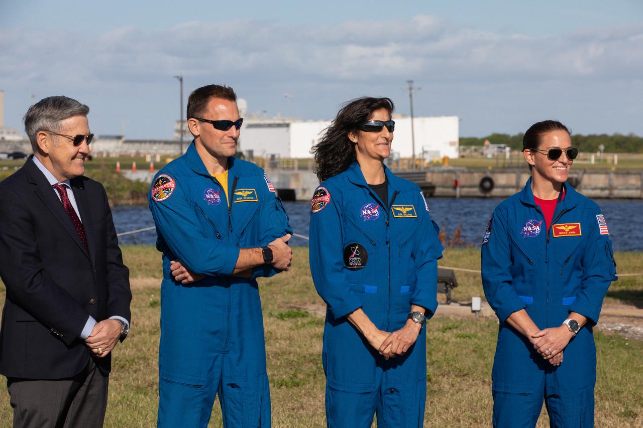 From left, Kennedy Space Center Director Bob Cabana and NASA astronauts Josh Cassada, Suni Williams and Nicole Mann participate in a Boeing Orbital Flight Test media briefing near the countdown clock at the Florida spaceport on Dec. 19, 2019. Boeing’s CST-100 Starliner spacecraft will launch atop a United Launch Alliance Atlas V rocket from Space Launch Complex 41 at Cape Canaveral Air Force Station. The uncrewed Orbital Flight Test will be the Starliner’s first flight to the International Space Station for NASA’s Commercial Crew Program. 