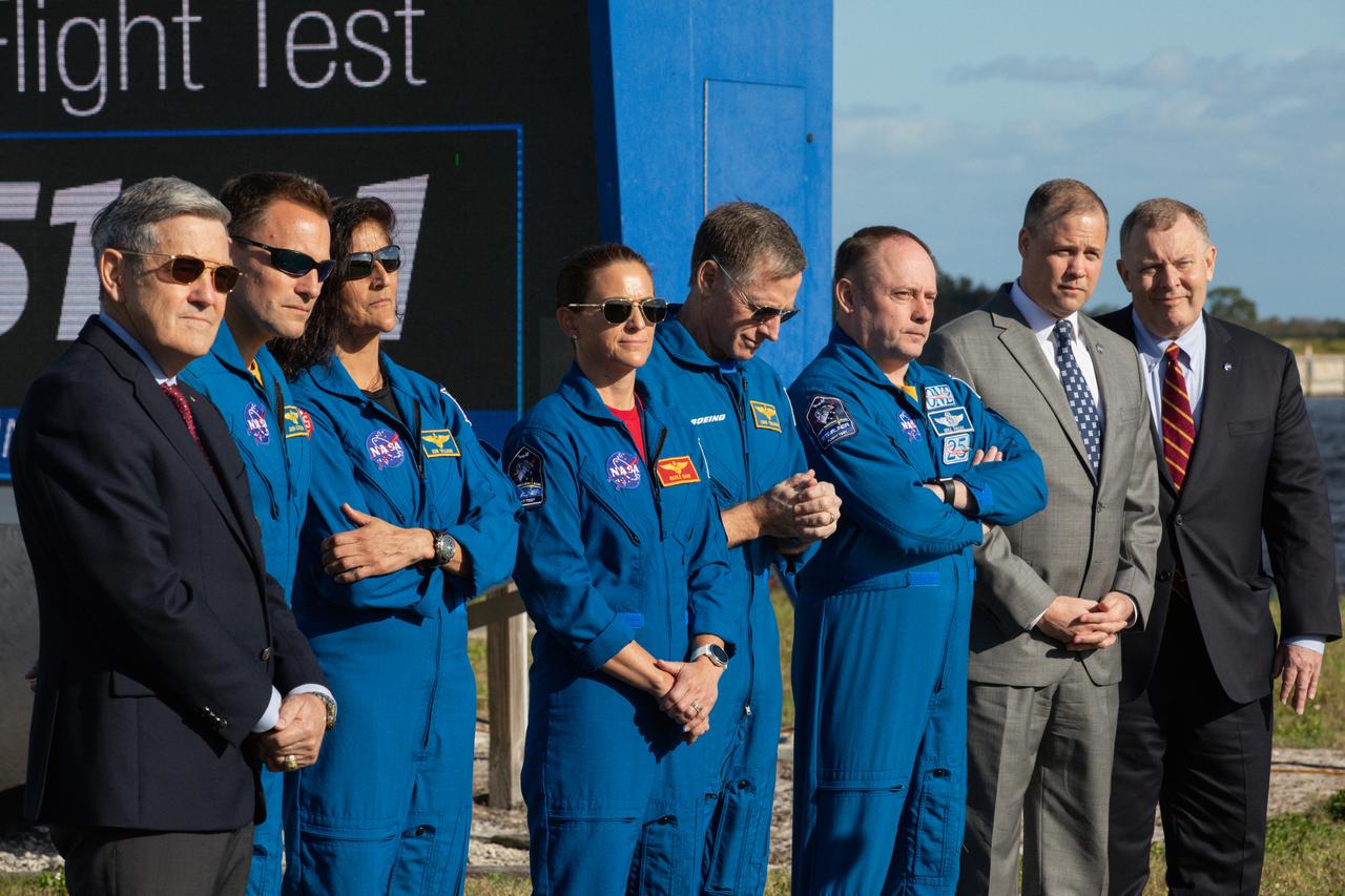 NASA Administrator Jim Bridenstine, Kennedy Space Center Director Bob Cabana, and astronauts representing NASA and Boeing participate in a Boeing Orbital Flight Test media briefing near the countdown clock at the Florida spaceport on Dec. 19, 2019. From left to right are Cabana; NASA astronauts Josh Cassada, Suni Williams and Nicole Mann; Boeing astronaut Chris Ferguson; NASA astronaut Mike Finke; Bridenstine; and NASA Deputy Administrator Jim Morhard. Boeing’s CST-100 Starliner spacecraft will launch atop a United Launch Alliance Atlas V rocket from Space Launch Complex 41 at Cape Canaveral Air Force Station. The uncrewed Orbital Flight Test will be the Starliner’s first flight to the International Space Station for NASA’s Commercial Crew Program.