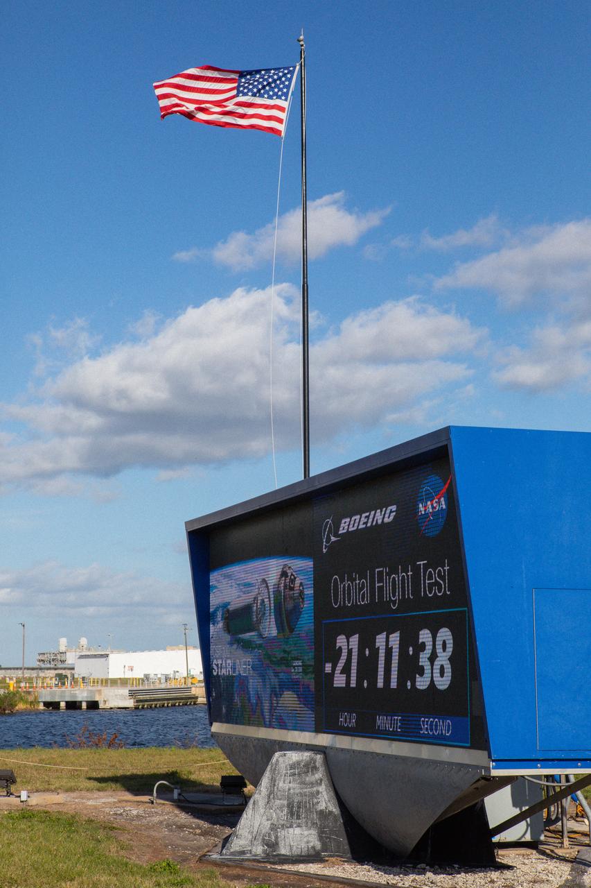 The countdown clock at NASA’s Kennedy Space Center in Florida is photographed during a Boeing Orbital Flight Test media briefing on Dec. 19, 2019. Boeing’s CST-100 Starliner spacecraft will launch atop a United Launch Alliance Atlas V rocket from Space Launch Complex 41 at Cape Canaveral Air Force Station. The uncrewed Orbital Flight Test will be the Starliner’s first flight to the International Space Station for NASA’s Commercial Crew Program.
