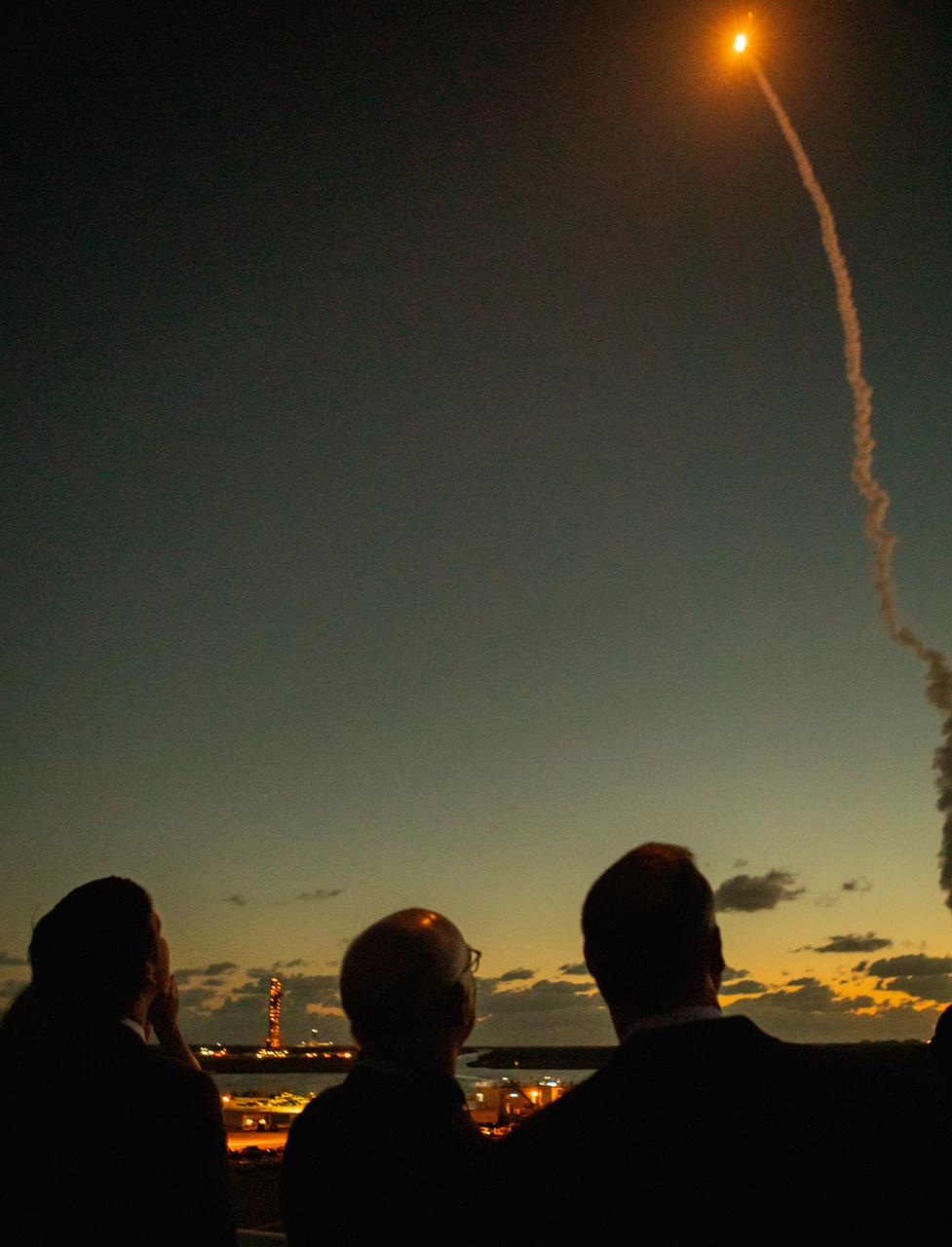 In the foreground, from left to right, Florida Governor Ron DeSantis; Tory Bruno, president and chief executive officer of United Launch Alliance; and NASA Administrator Jim Bridenstine watch the launch of a United Launch Alliance Atlas V rocket carrying Boeing’s CST-100 Starliner spacecraft for Boeing’s Orbital Flight Test, Dec. 20, 2019. Liftoff occurred at 6:36 a.m. EST from Space Launch Complex 41 at Florida’s Cape Canaveral Air Force Station. The uncrewed Orbital Flight Test is the Starliner’s first flight for NASA’s Commercial Crew Program.
