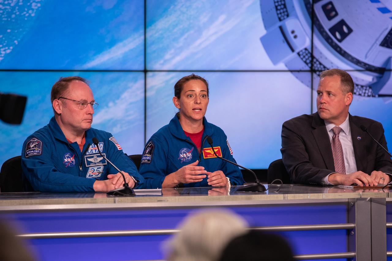 NASA astronaut Nicole Mann speaks during a briefing at the agency’s Kennedy Space Center in Florida following launch of Boeing’s Orbital Flight Test, Dec. 20, 2019. Beside her are NASA astronaut Mike Fincke, left, and NASA Administrator Jim Bridenstine. Boeing’s CST-100 Starliner spacecraft launched atop a United Launch Alliance Atlas V rocket from Space Launch Complex 41 at Cape Canaveral Air Force Station at 6:36 a.m. EST. The uncrewed Orbital Flight Test is the Starliner’s first flight for NASA’s Commercial Crew Program.