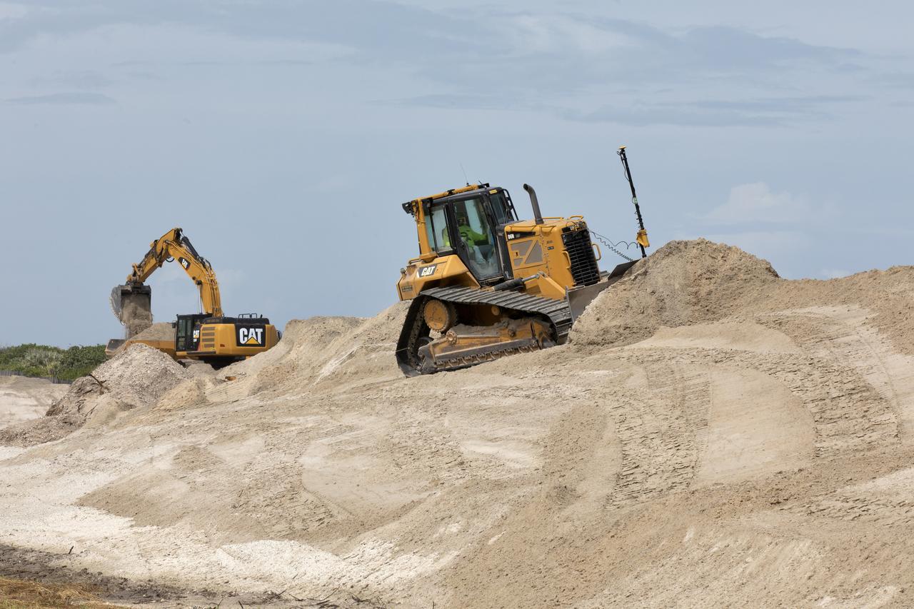 Restoration efforts are underway to the dunes at the north beaches at NASA’s Kennedy Space Center in Florida on Oct. 8, 2018. About 450,000 cubic yards of beach-quality sand, tested for compatibility, is being transported to the space center’s beaches. One the dune is built up, native coastal vegetation will be replanted, helping to stabilize the dune and offer a habitat for Kennedy’s coast wildlife. Dunes are affected by beach erosion and storm surge from tropical events, such as hurricanes. Restoration began in spring 2018 and is targeted to be completed by April 2019.