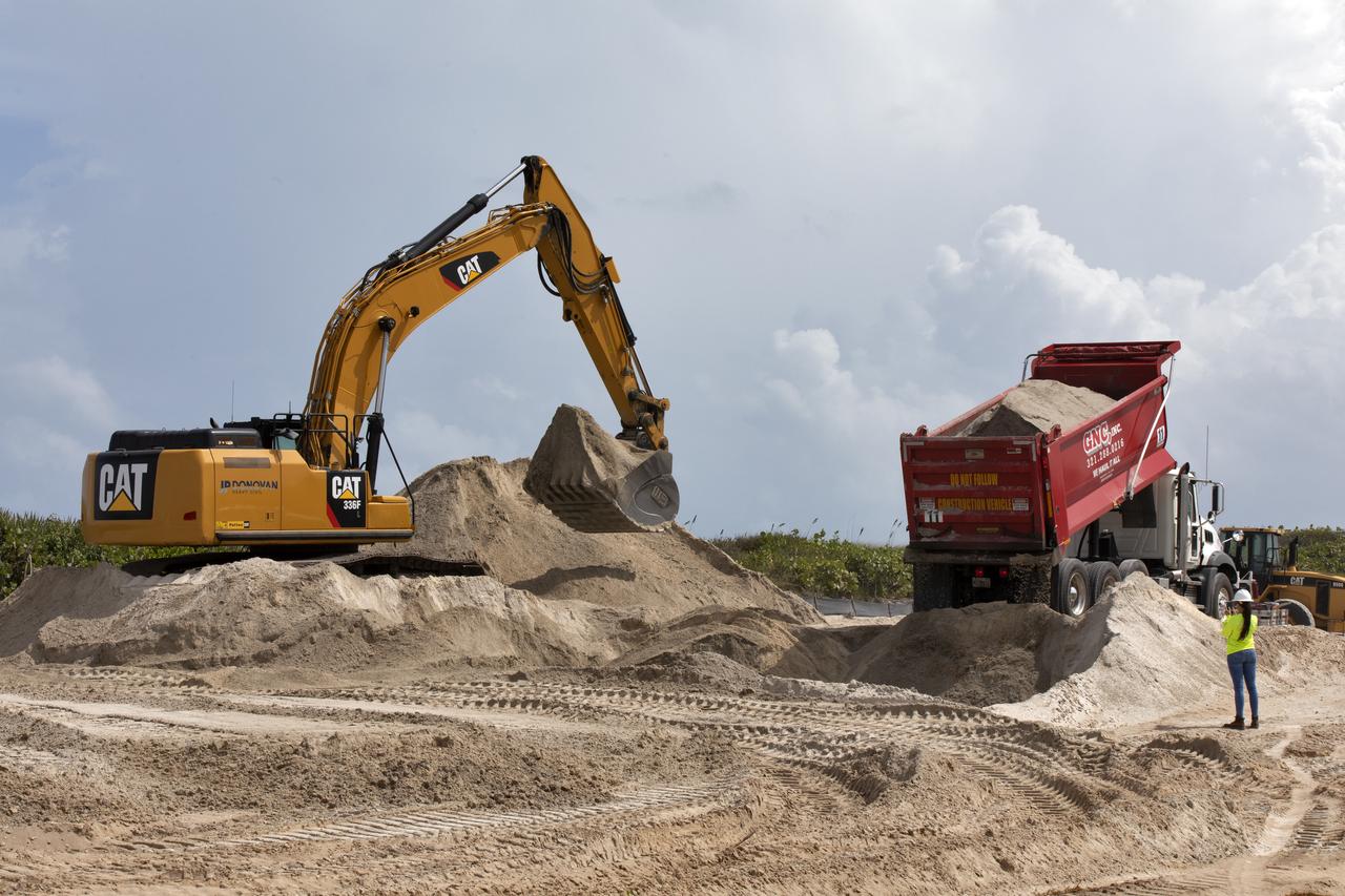 Restoration efforts are underway to the dunes at the north beaches at NASA’s Kennedy Space Center in Florida on Oct. 8, 2018. About 450,000 cubic yards of beach-quality sand, tested for compatibility, is being transported to the space center’s beaches. One the dune is built up, native coastal vegetation will be replanted, helping to stabilize the dune and offer a habitat for Kennedy’s coast wildlife. Dunes are affected by beach erosion and storm surge from tropical events, such as hurricanes. Restoration began in spring 2018 and is targeted to be completed by April 2019.