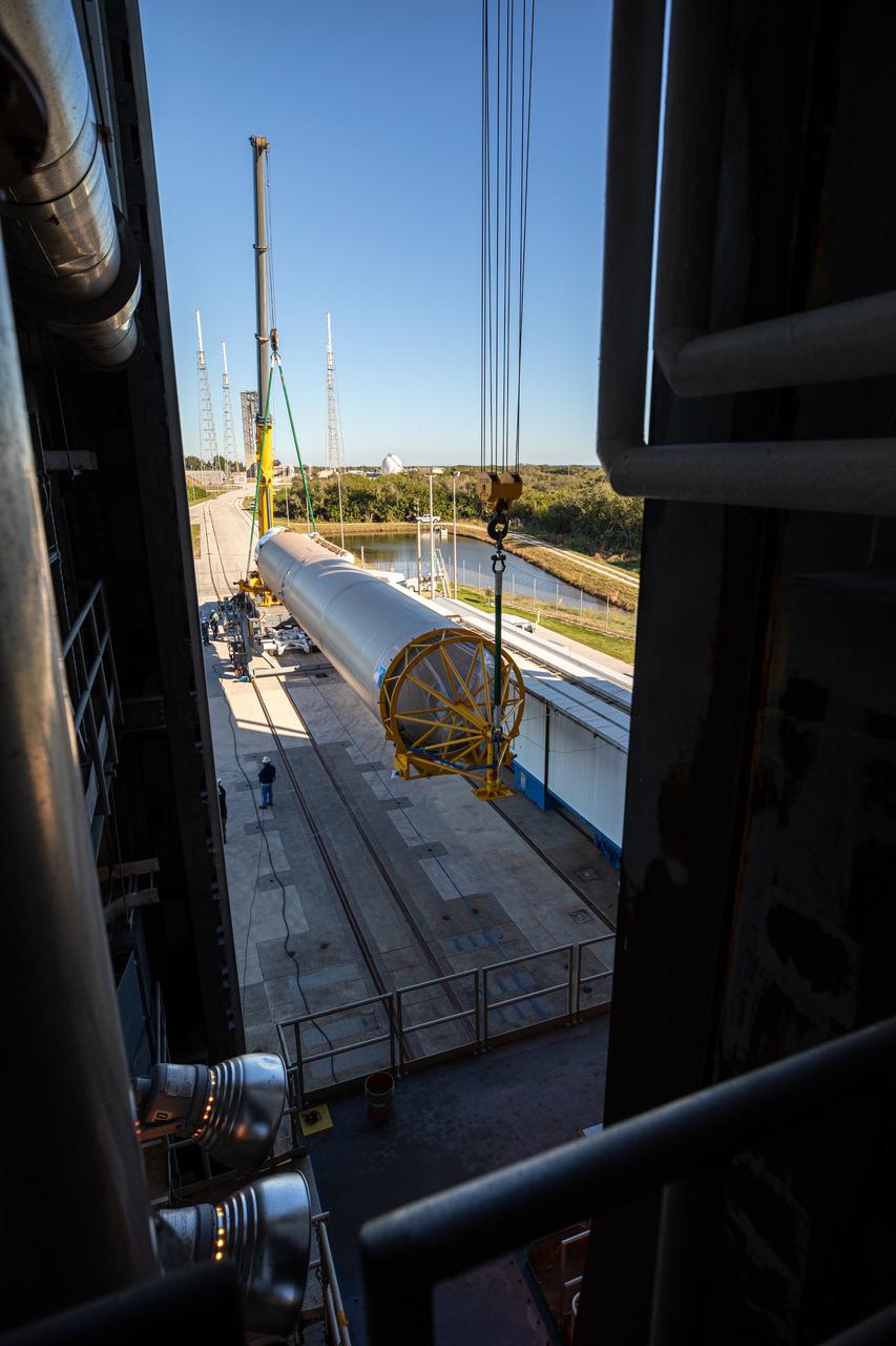 The booster of a United Launch Alliance Atlas V rocket that will launch the Solar Orbiter spacecraft is lifted into the vertical position at the Vertical Integration Facility near Space Launch Complex 41 at Cape Canaveral Air Force Station in Florida on Jan. 6, 2020. Solar Orbiter is an international cooperative mission between ESA (European Space Agency) and NASA. The mission aims to study the Sun, its outer atmosphere and solar wind. The spacecraft will provide the first images of the Sun’s poles. NASA’s Launch Services Program based at Kennedy Space Center in Florida is managing the launch.