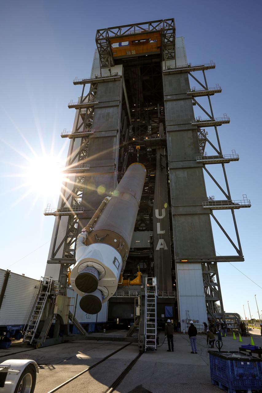 The booster of a United Launch Alliance Atlas V rocket that will launch the Solar Orbiter spacecraft is lifted into the vertical position at the Vertical Integration Facility near Space Launch Complex 41 at Cape Canaveral Air Force Station in Florida on Jan. 6, 2020. Solar Orbiter is an international cooperative mission between ESA (European Space Agency) and NASA. The mission aims to study the Sun, its outer atmosphere and solar wind. The spacecraft will provide the first images of the Sun’s poles. NASA’s Launch Services Program based at Kennedy Space Center in Florida is managing the launch.
